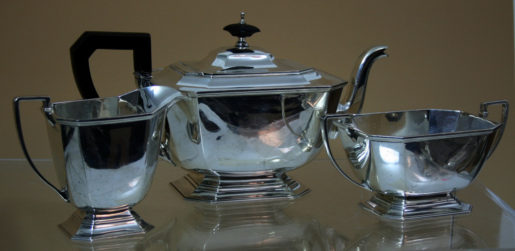 A three piece colonial tea service