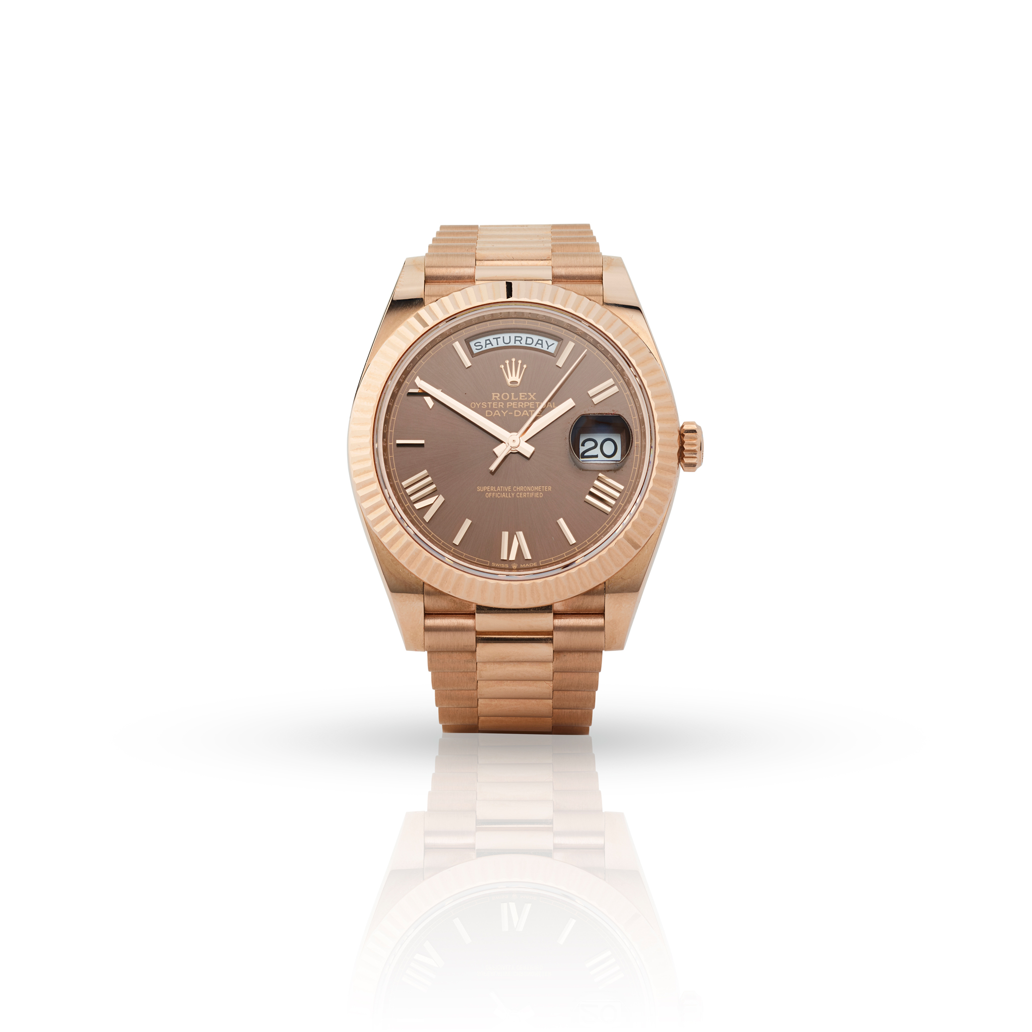 Rolex. A fine 18k rose gold self-winding day-date wristwatch on bracelet