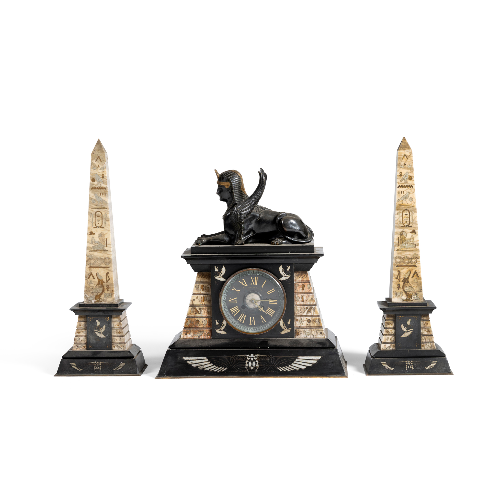 A BLACK SLATE AND MARBLE CLOCK GARNITURE OF EGYPTIAN TASTE