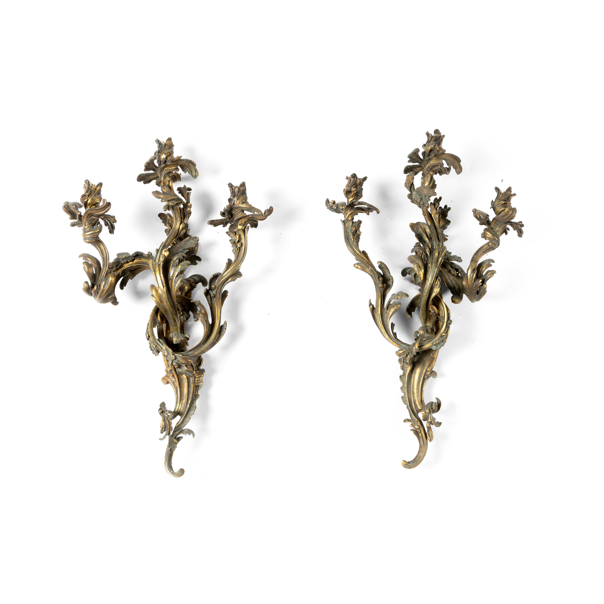 A PAIR OF GILT BRONZE FOLIATE THREE BRANCH WALL LIGHTS