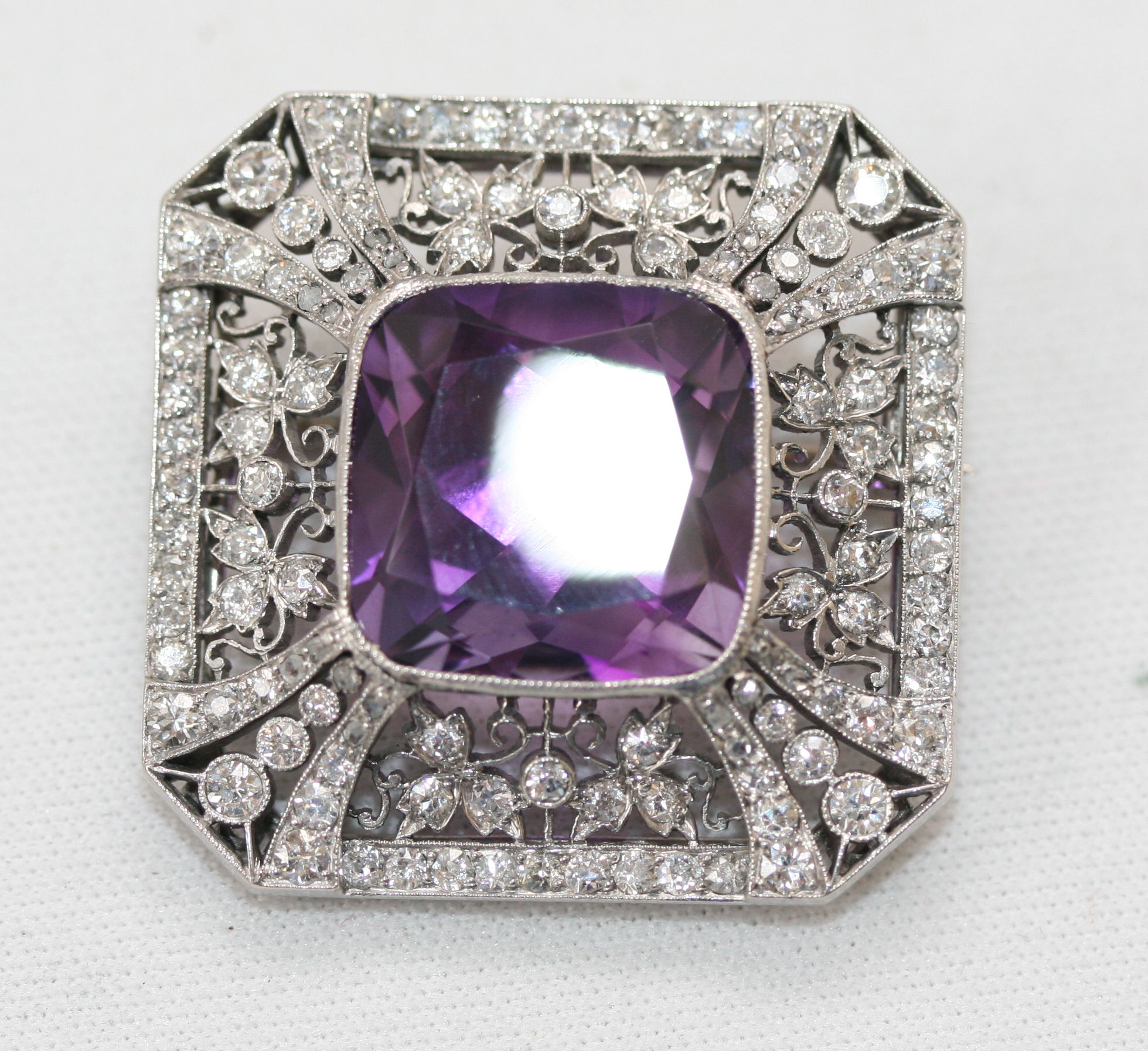An early 20th century amethyst and diamond set brooch,