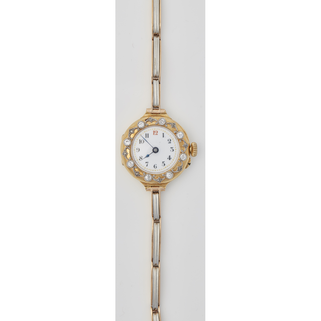 A lady's diamond set 18ct gold wrist watch