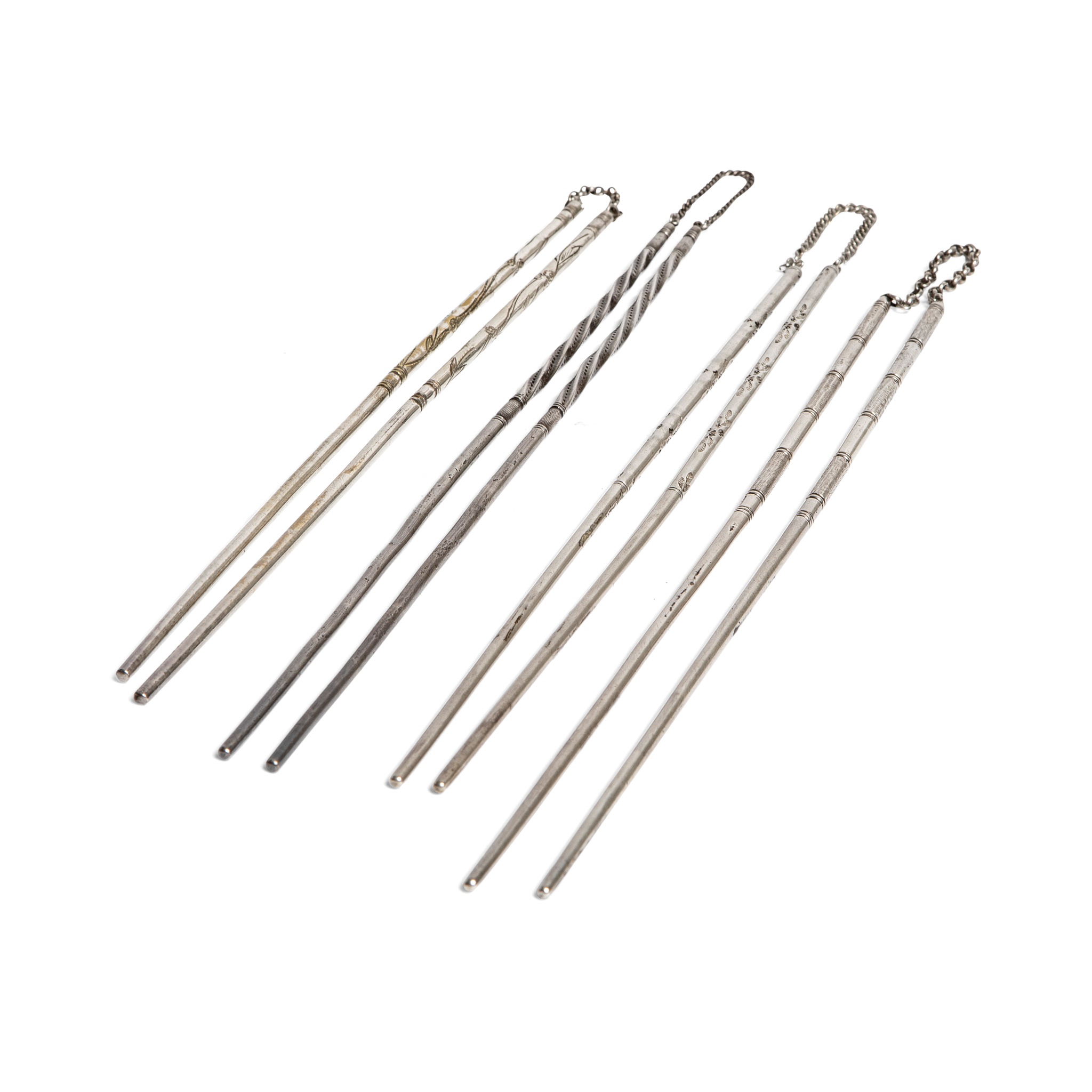 FOUR SETS OF SILVER CHOPSTICKS