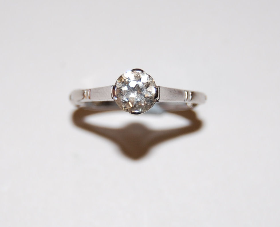 A platinum set diamond solitaire ring
