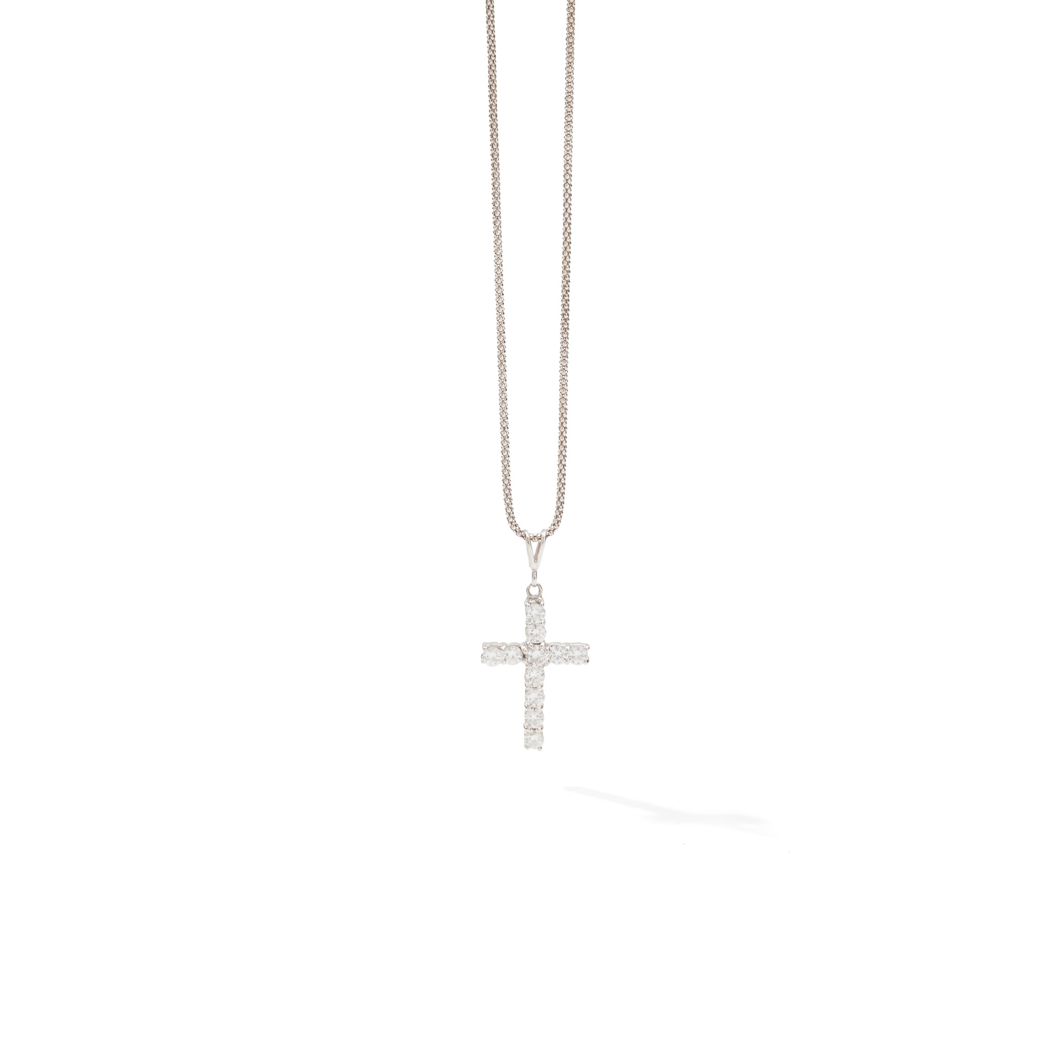 A diamond cross pendant
