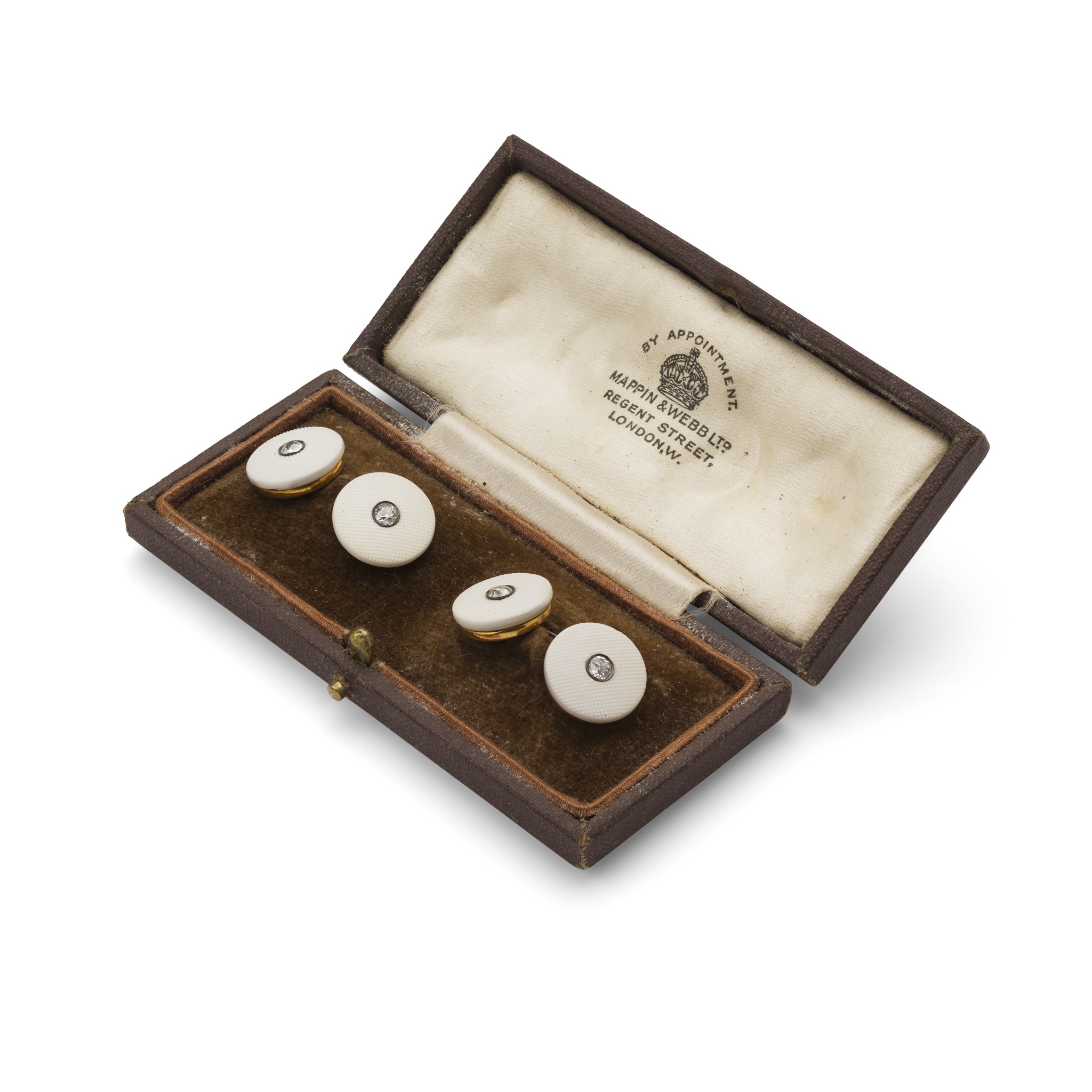 A pair of carved shell and diamond cufflinks