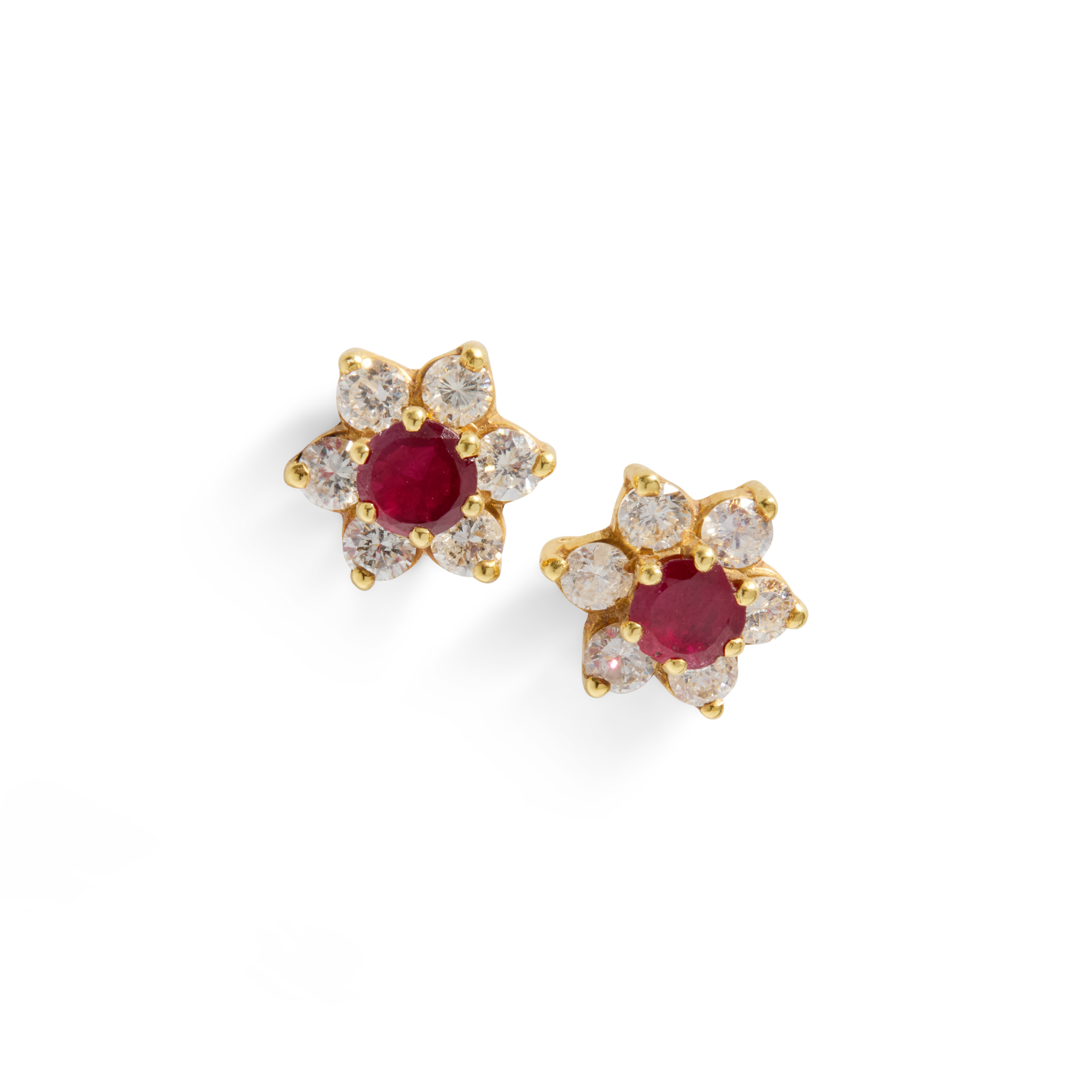 A pair of ruby and diamond cluster earrings