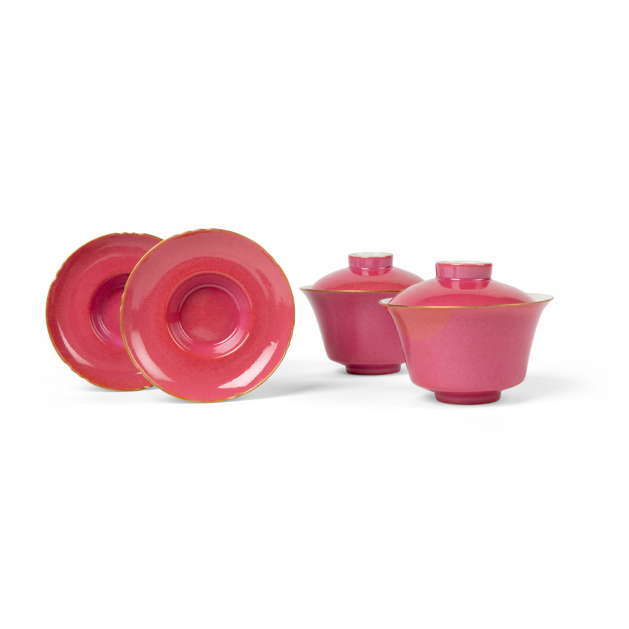 TWO SETS OF CHINESE RUBY-PINK-ENAMELLED TEA BOWLS WITH LIDS AND SAUCERS