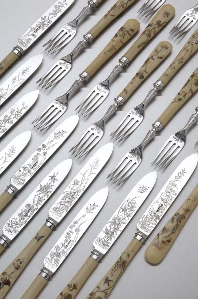 A set of twelve pairs of ivory Shibayama decorated dessert knives and forks,