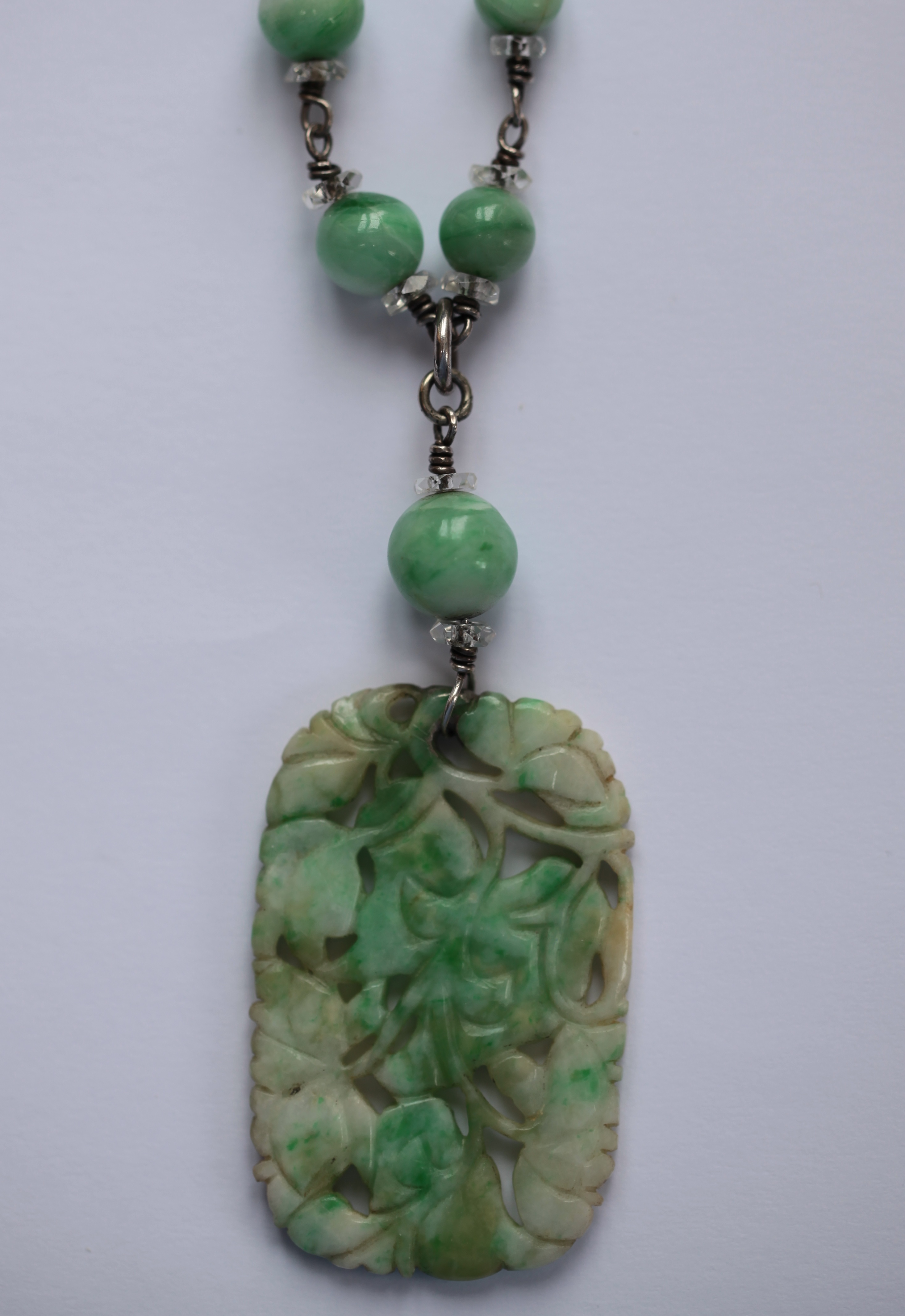 A carved jadeite necklace