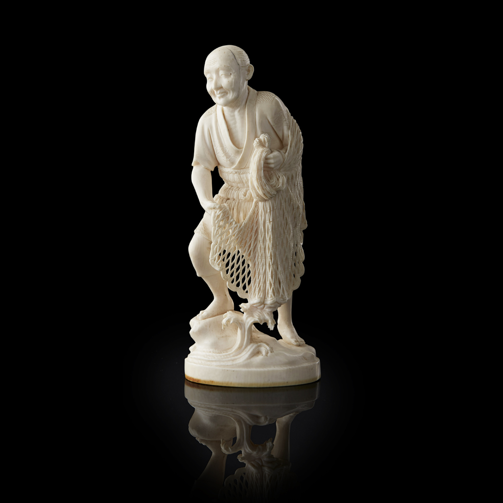 IVORY OKIMONO OF A FISHERMAN
