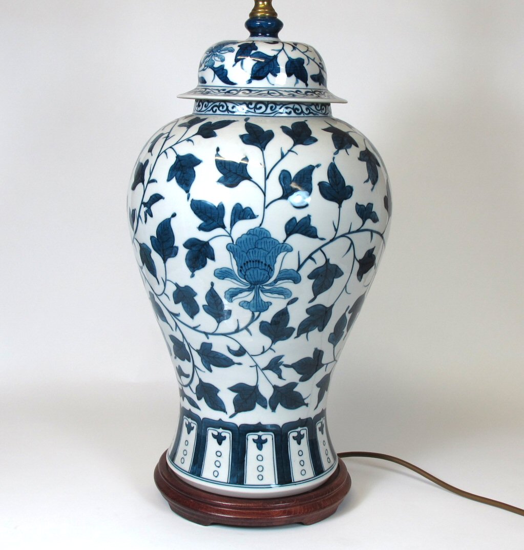 A pair of modern blue painted lamps