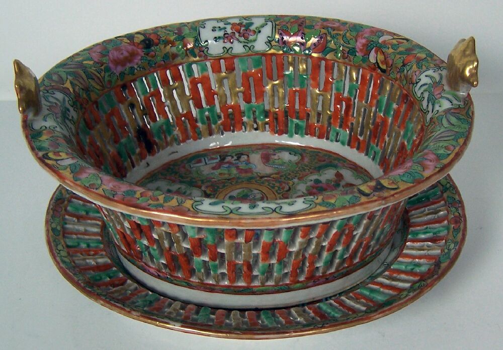 A 19th century Chinese famille rose chestnut basket and stand