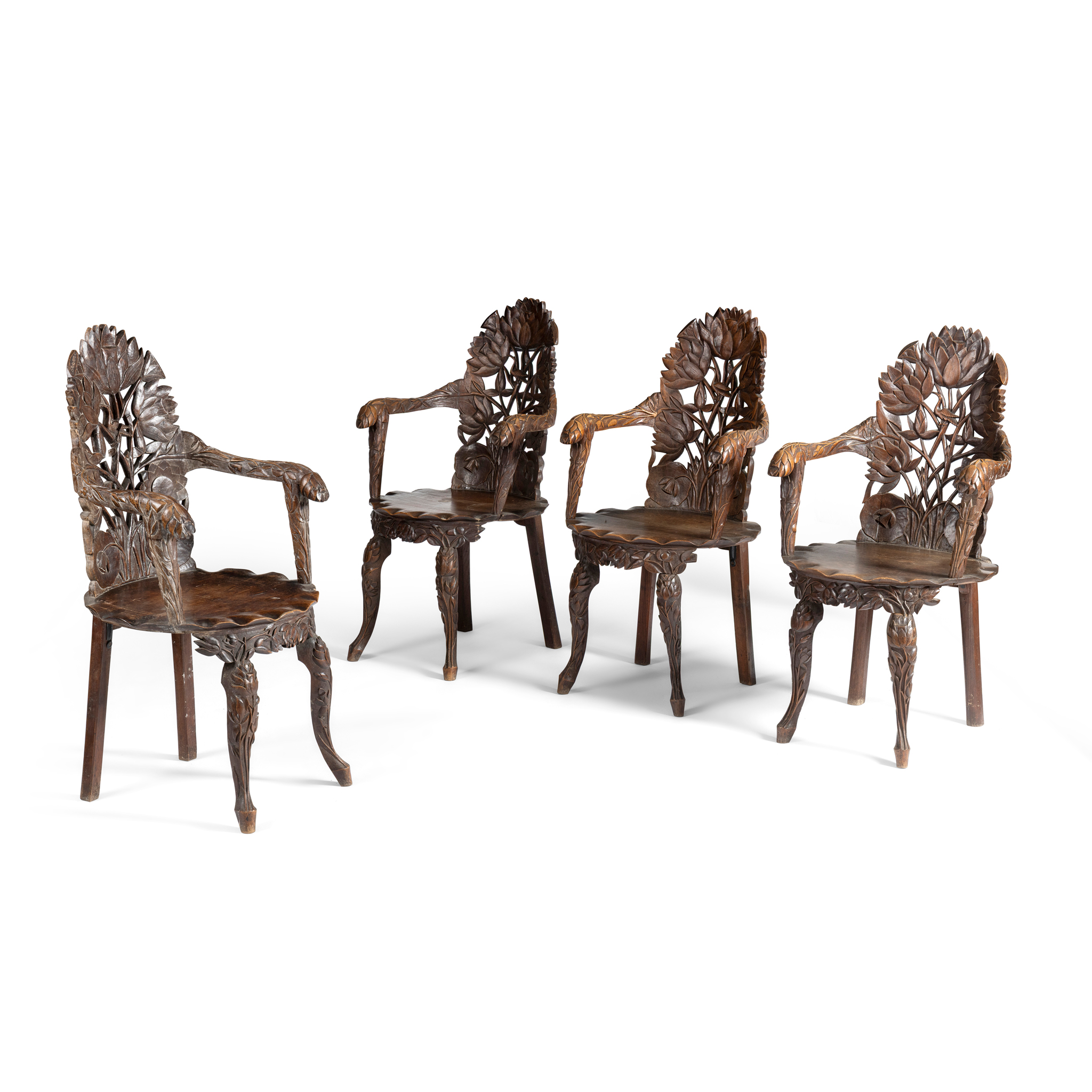 A SET OF FOUR SOUTH EAST ASIAN HARDWOOD CHAIRS