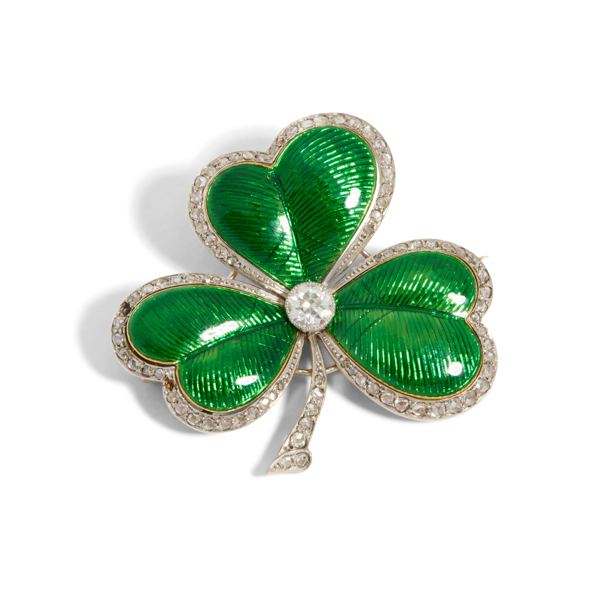 An early 20th century enamel and diamond shamrock brooch