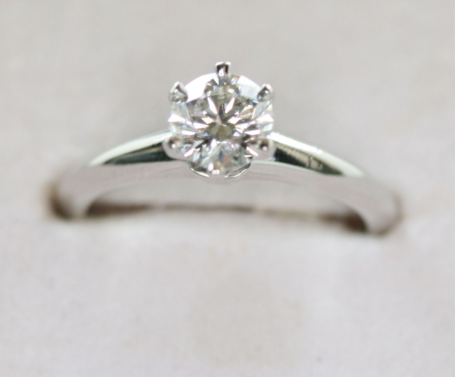 TIFFANY & CO - a platinum mounted diamond single-stone ring