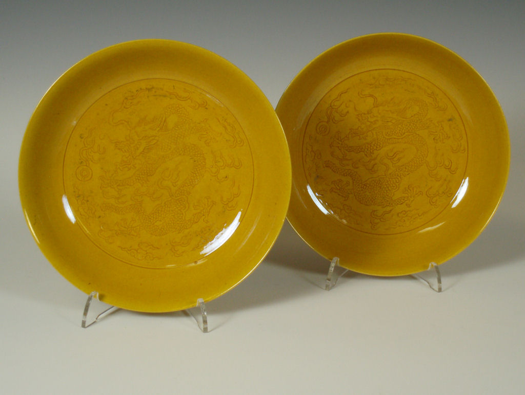 A pair of Chinese yellow glazed bowls, Daoguang Period