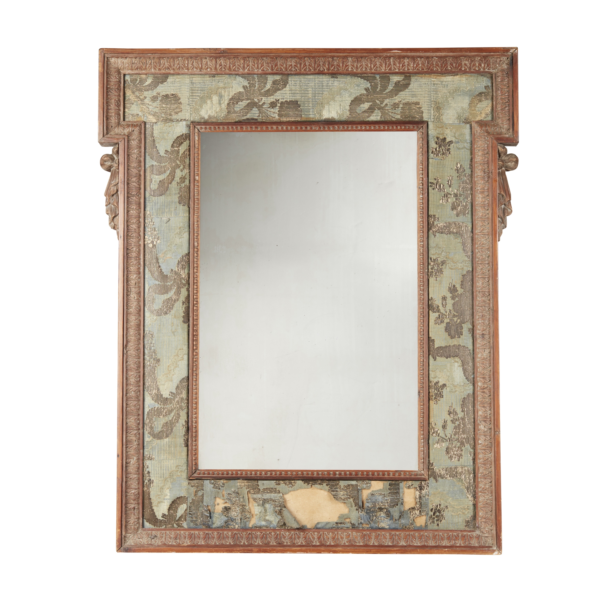 CONTINENTAL CARVED WALNUT AND SILK LINED MIRROR