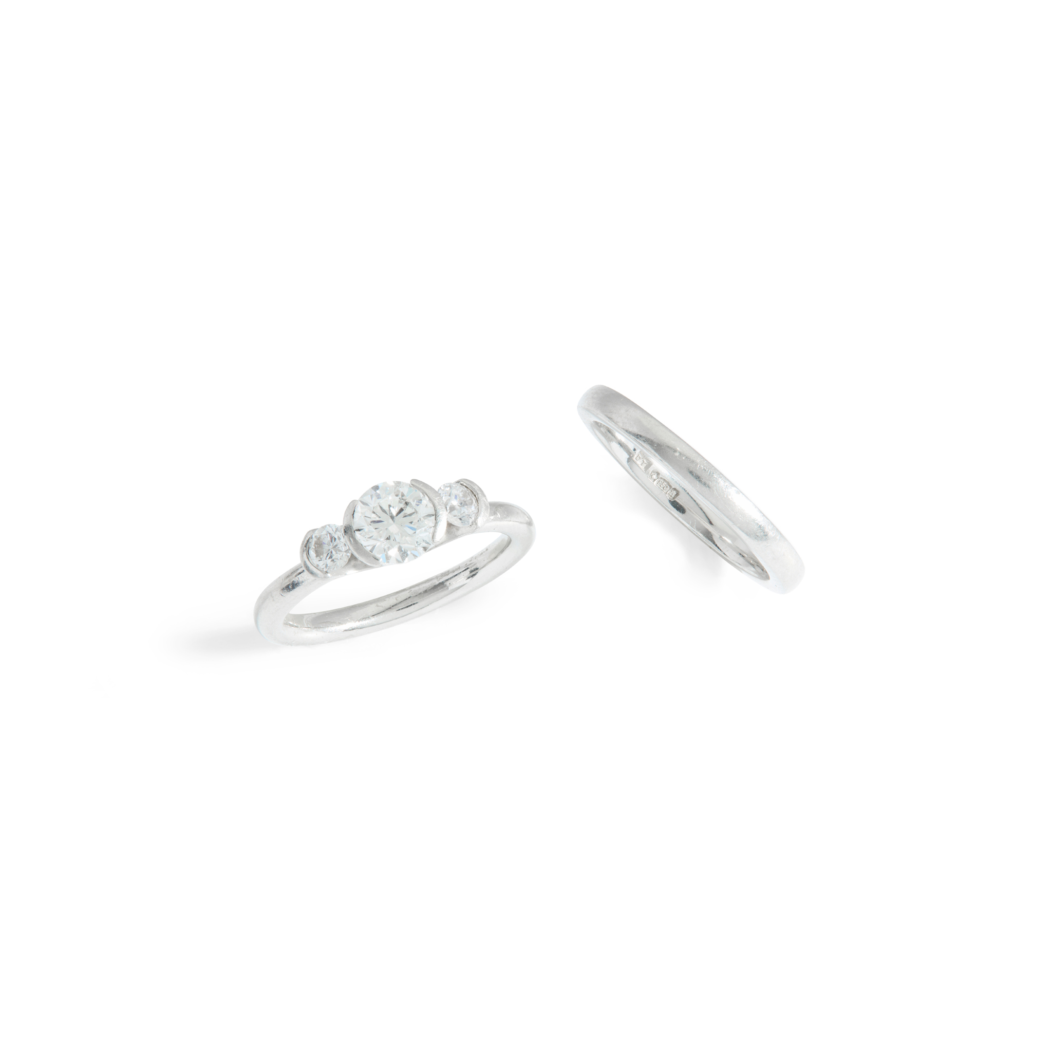 A platinum diamond three-stone ring