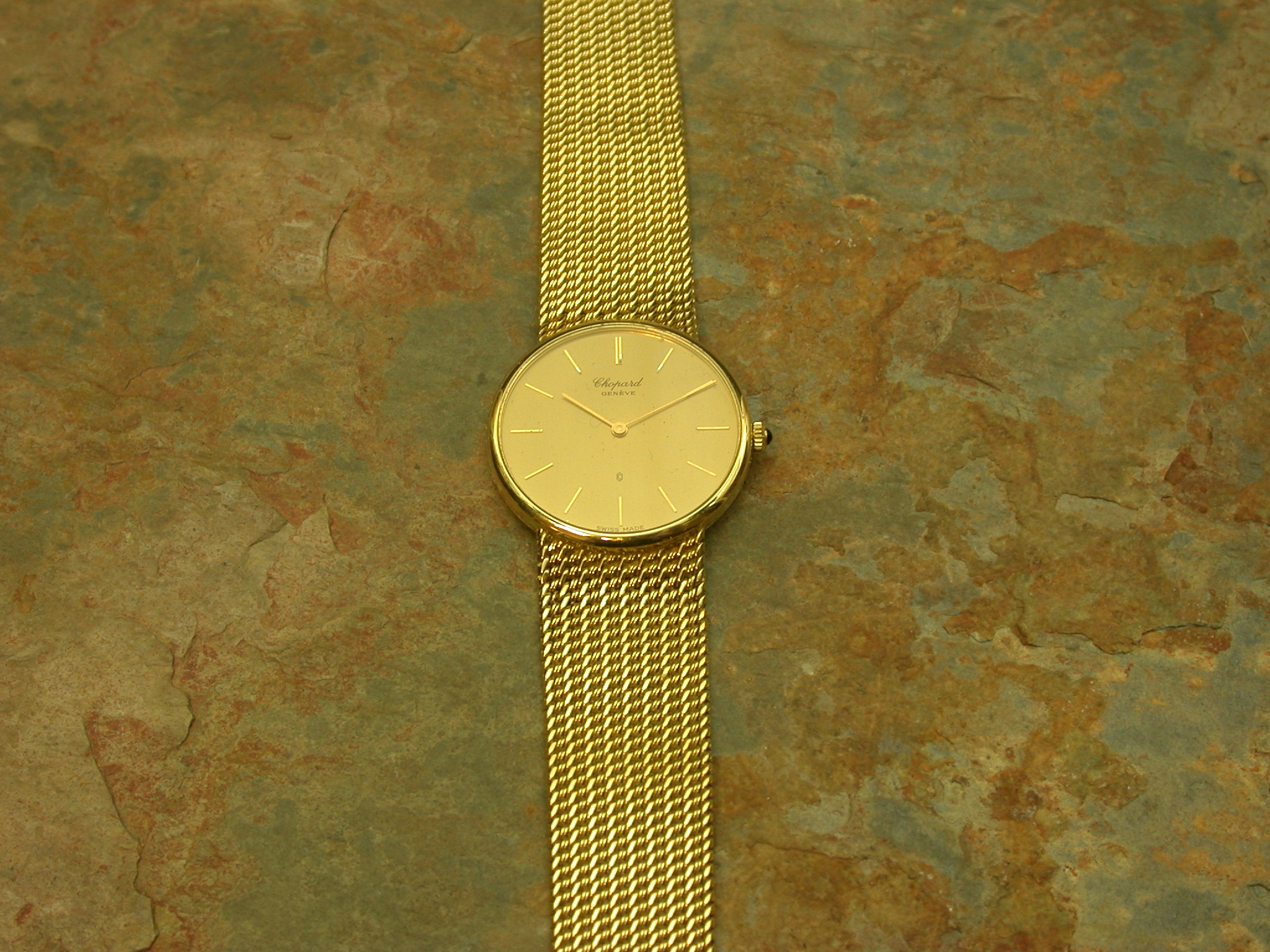 Chopard - a gentleman's gold wristwatch,