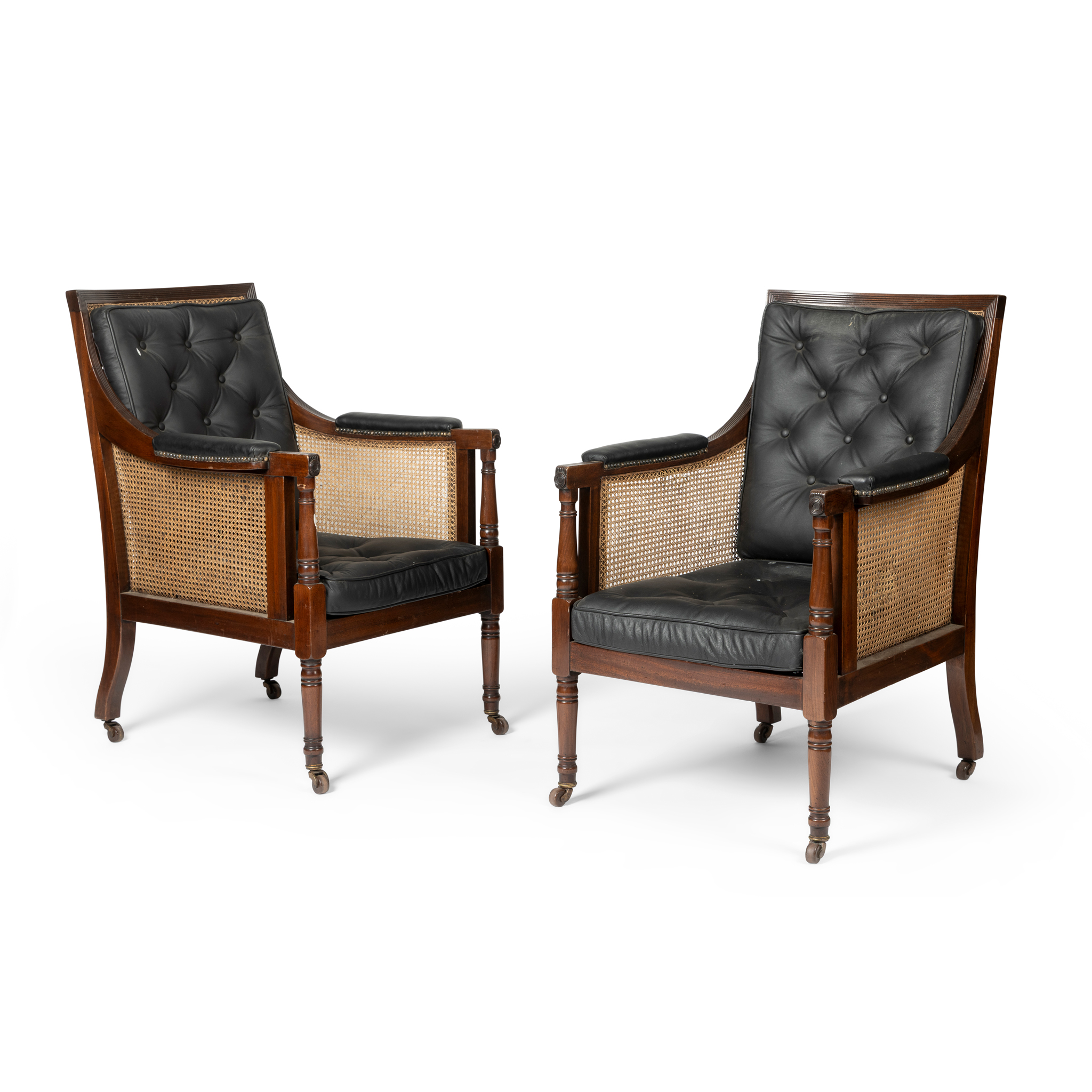 A PAIR OF MAHOGANY AND CANED BERGÈRES