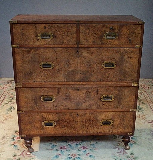 A mahogany and burr walnut veneered two piece campaign chest