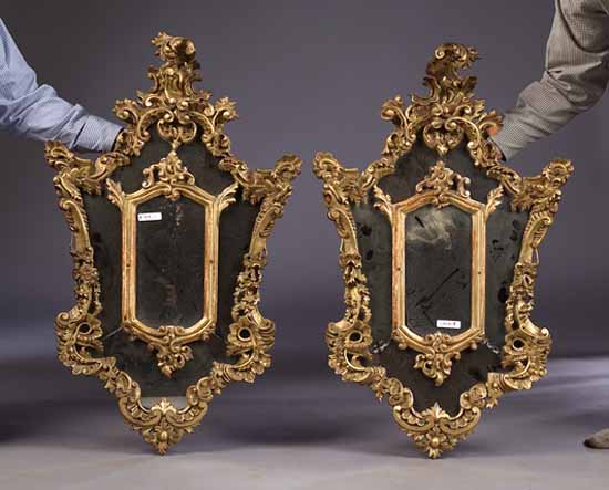 A pair of Rococo style giltwood mirrors