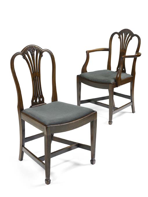 A set of eight early 20th century mahogany dining chairs In the Hepplewhite manner