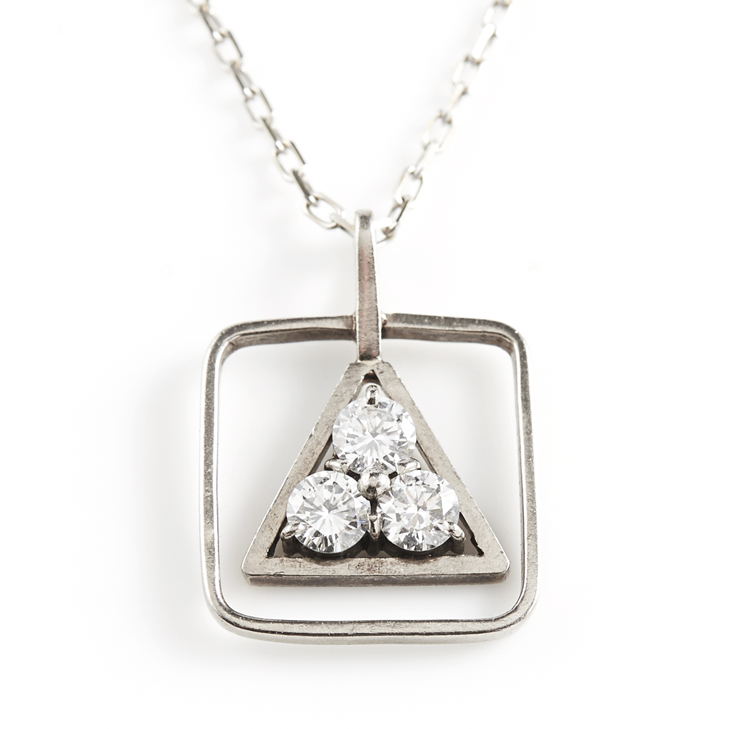 A three stone diamond pendant