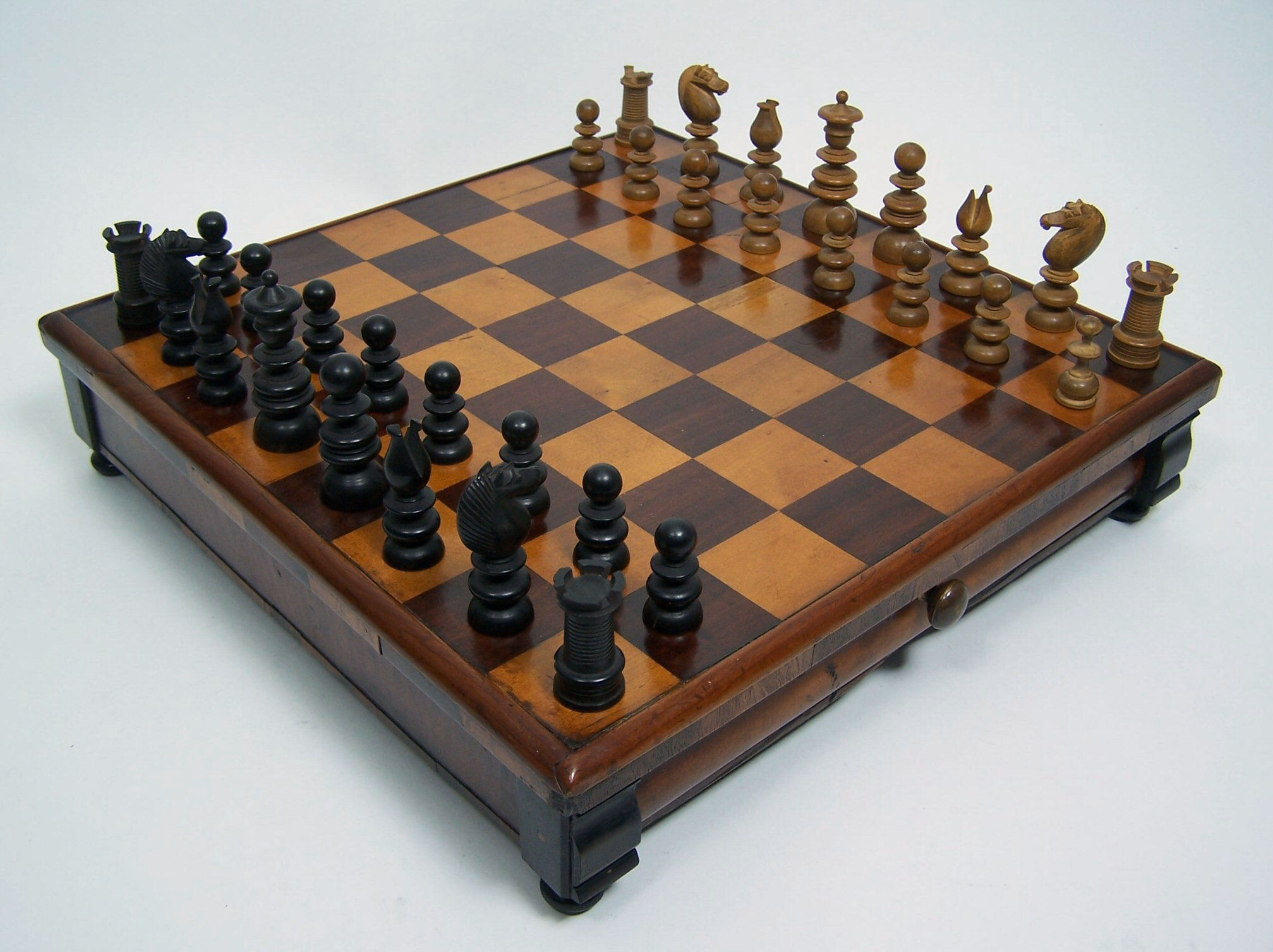 A mid 19th century mahogany and boxwood chessboard
