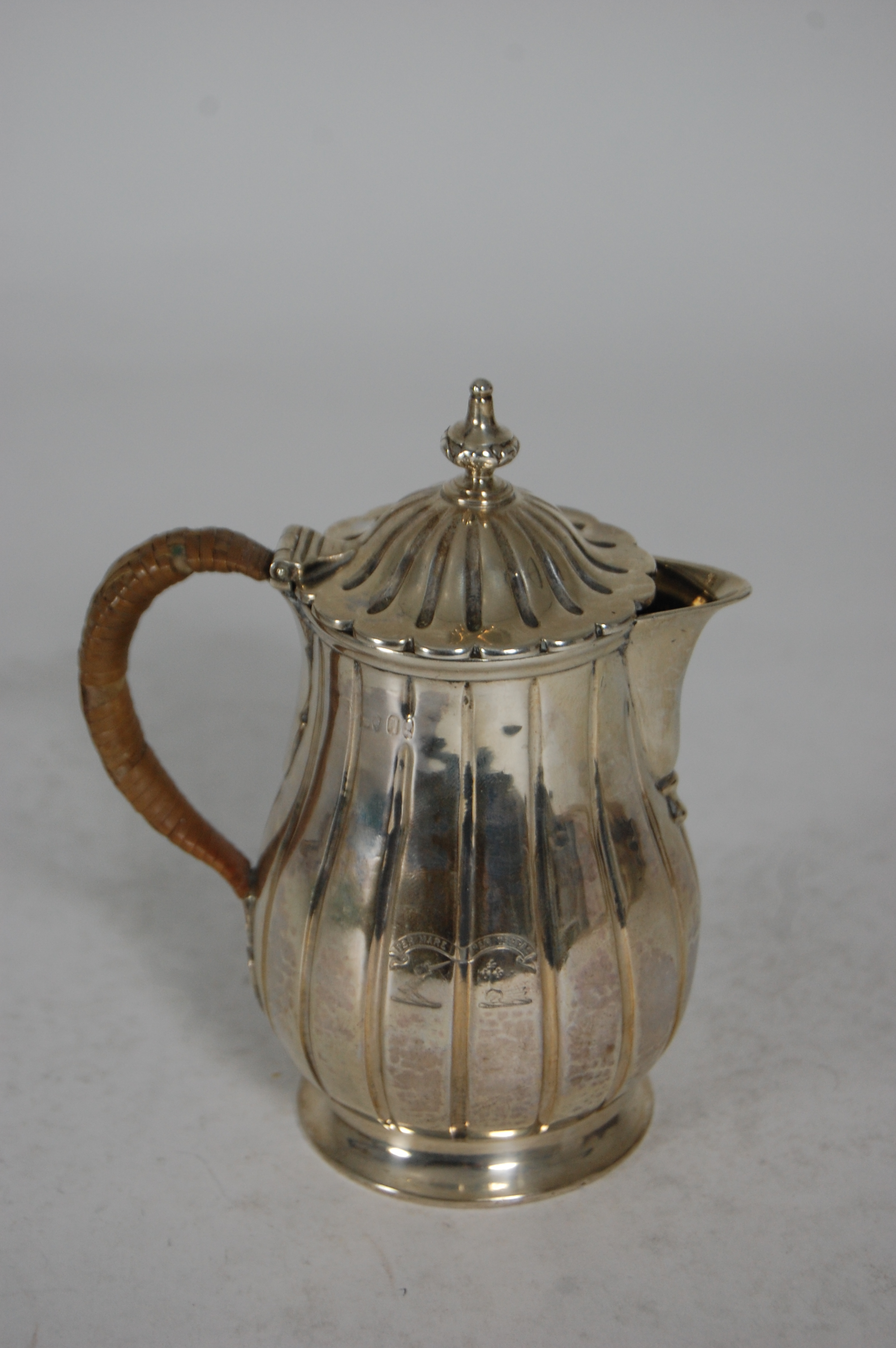 A George III covered milk pot