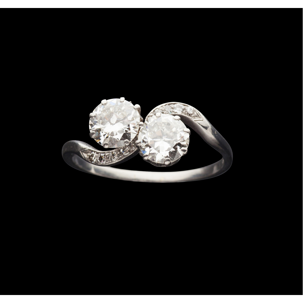 An early 20th century two-stone diamond set ring