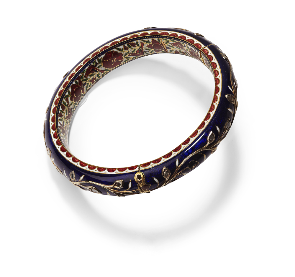 An Indian gold enamelled and diamond set bangle