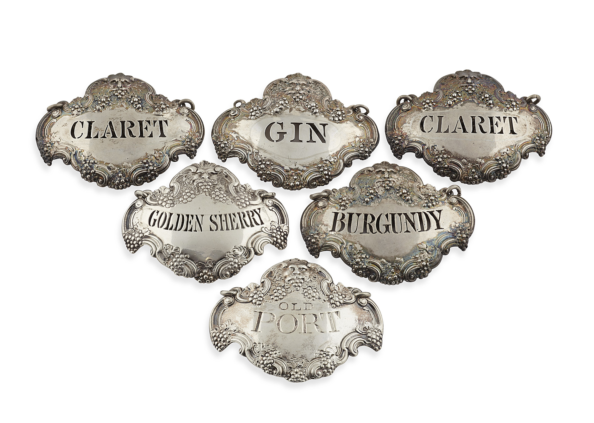 A matched group of six wine labels