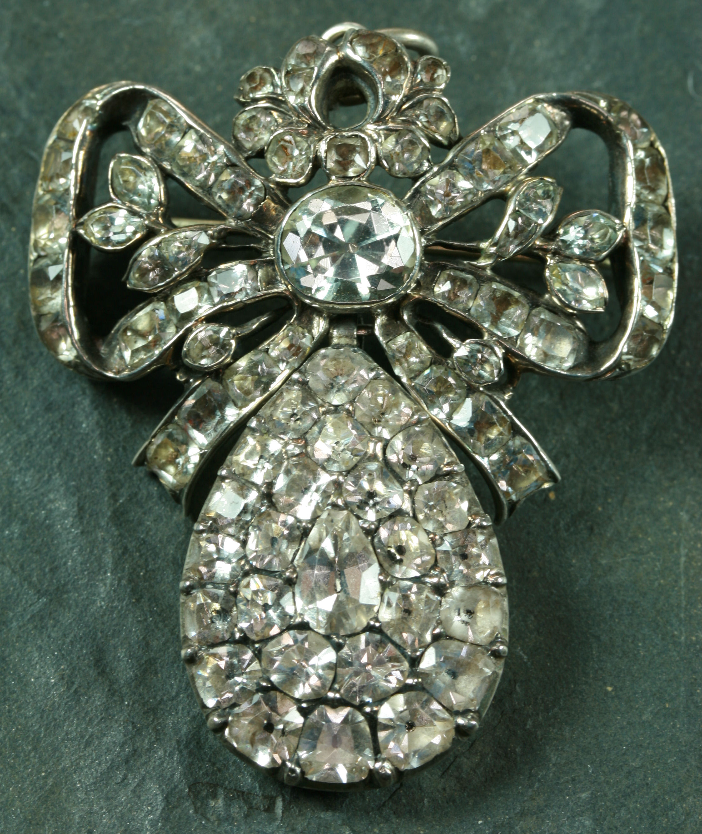 An early 19th century paste set brooch/pendant,