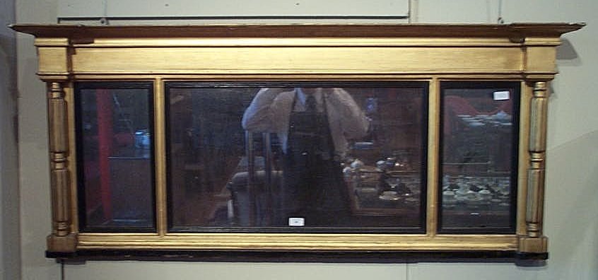 A Regency giltwood and gesso overmantle mirror,