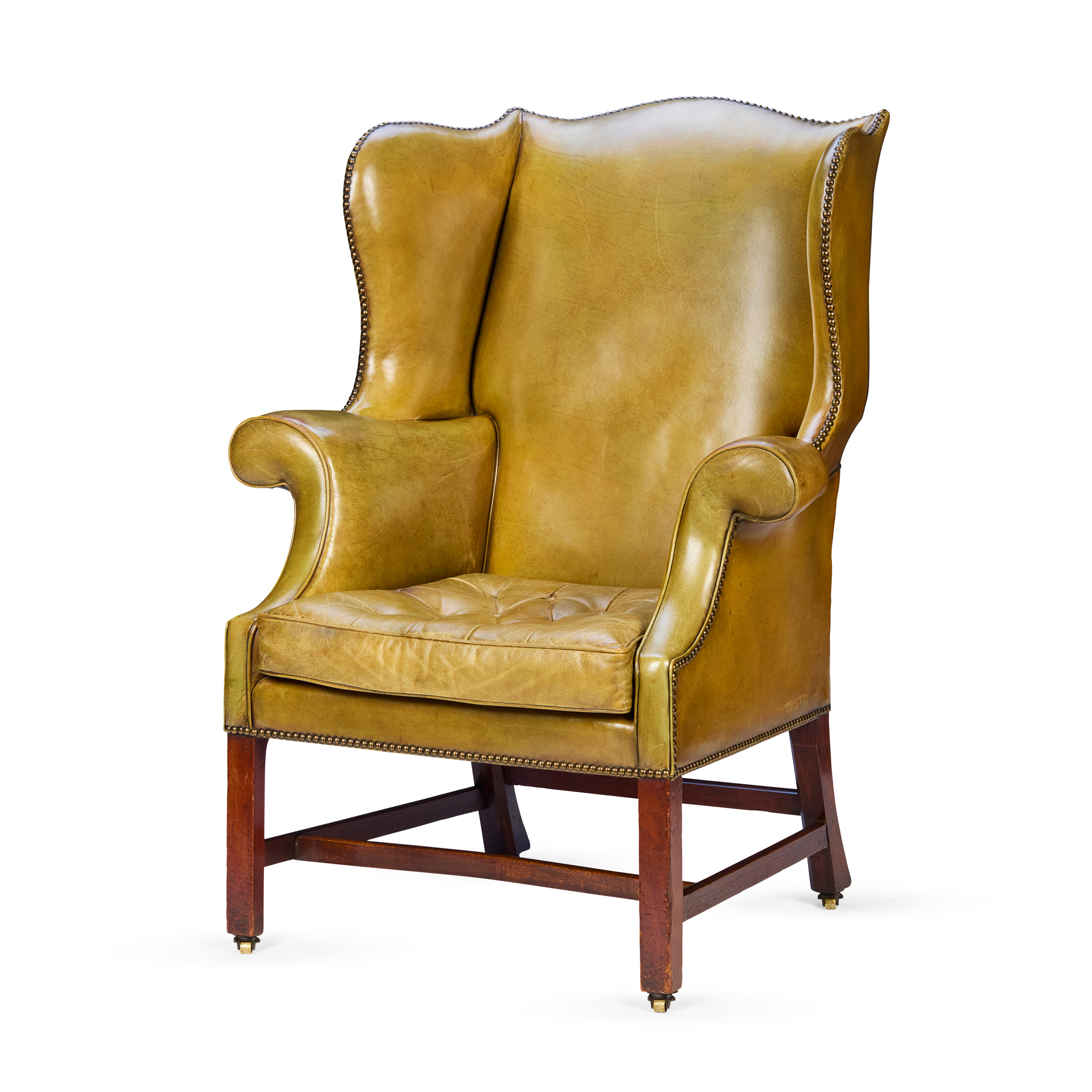 GEORGE III MAHOGANY LEATHER UPHOLSTERED WINGBACK ARMCHAIR
