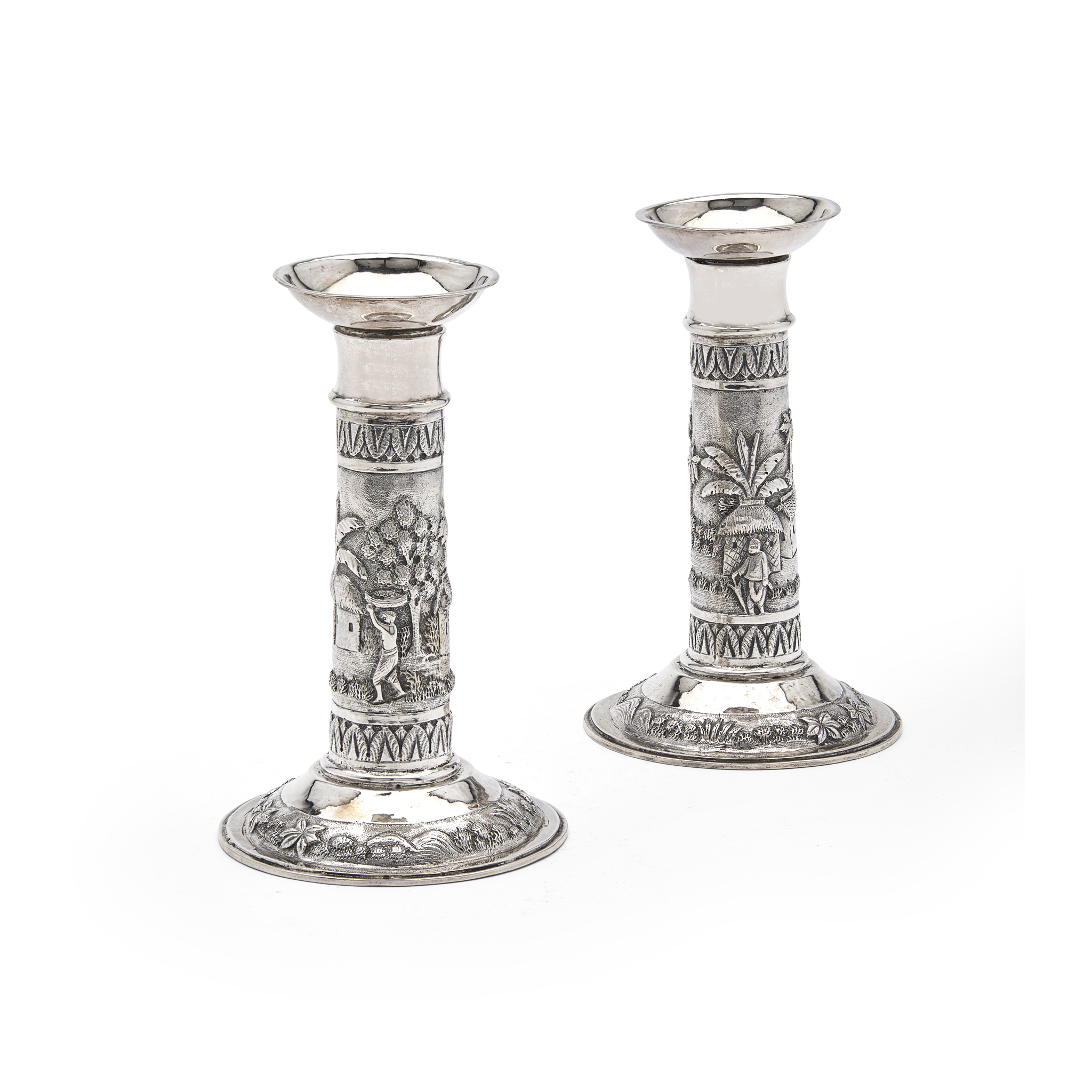 CALCUTTA - A PAIR OF 19TH CENTURY INDIAN CANDLESTICKS