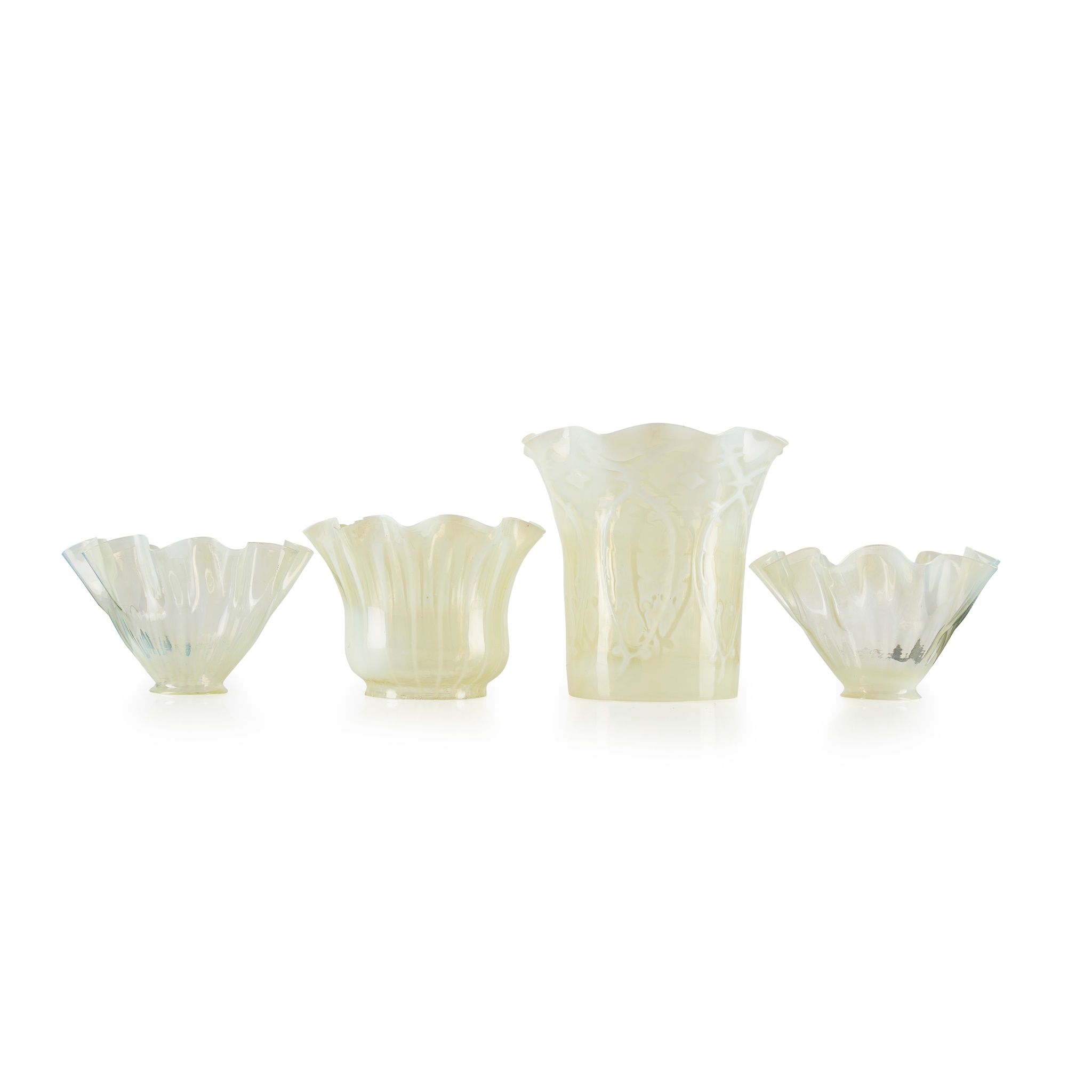 FOUR VASELINE GLASS LAMP SHADES