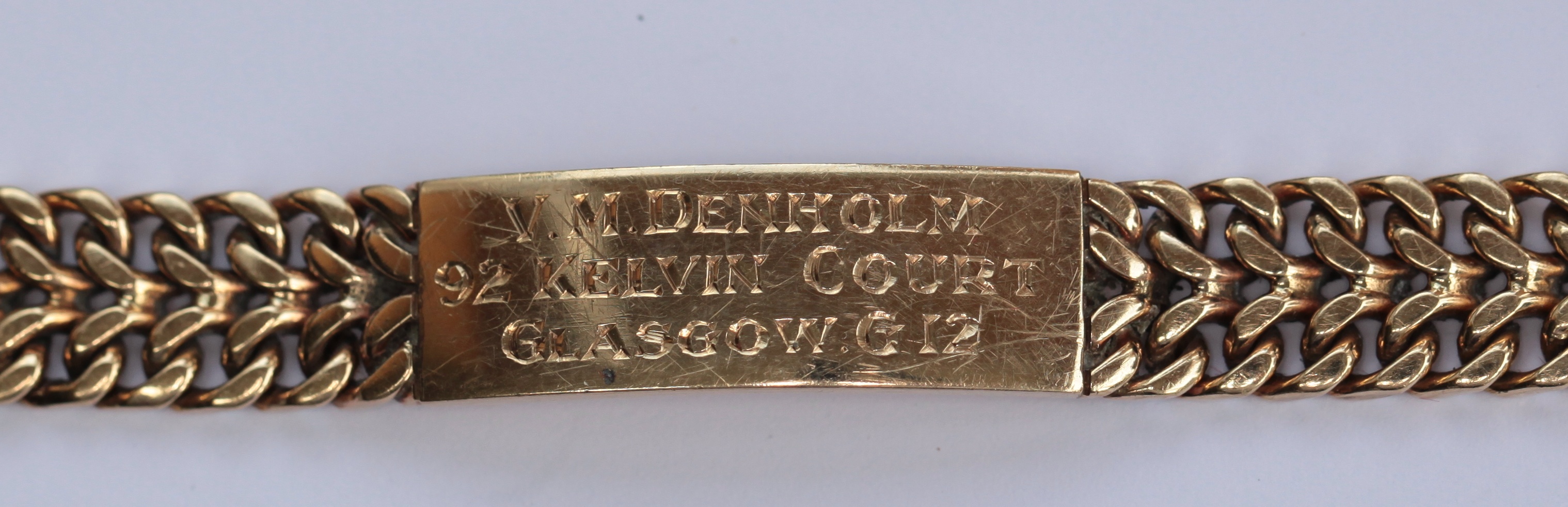 Two 9ct gold identity bracelets