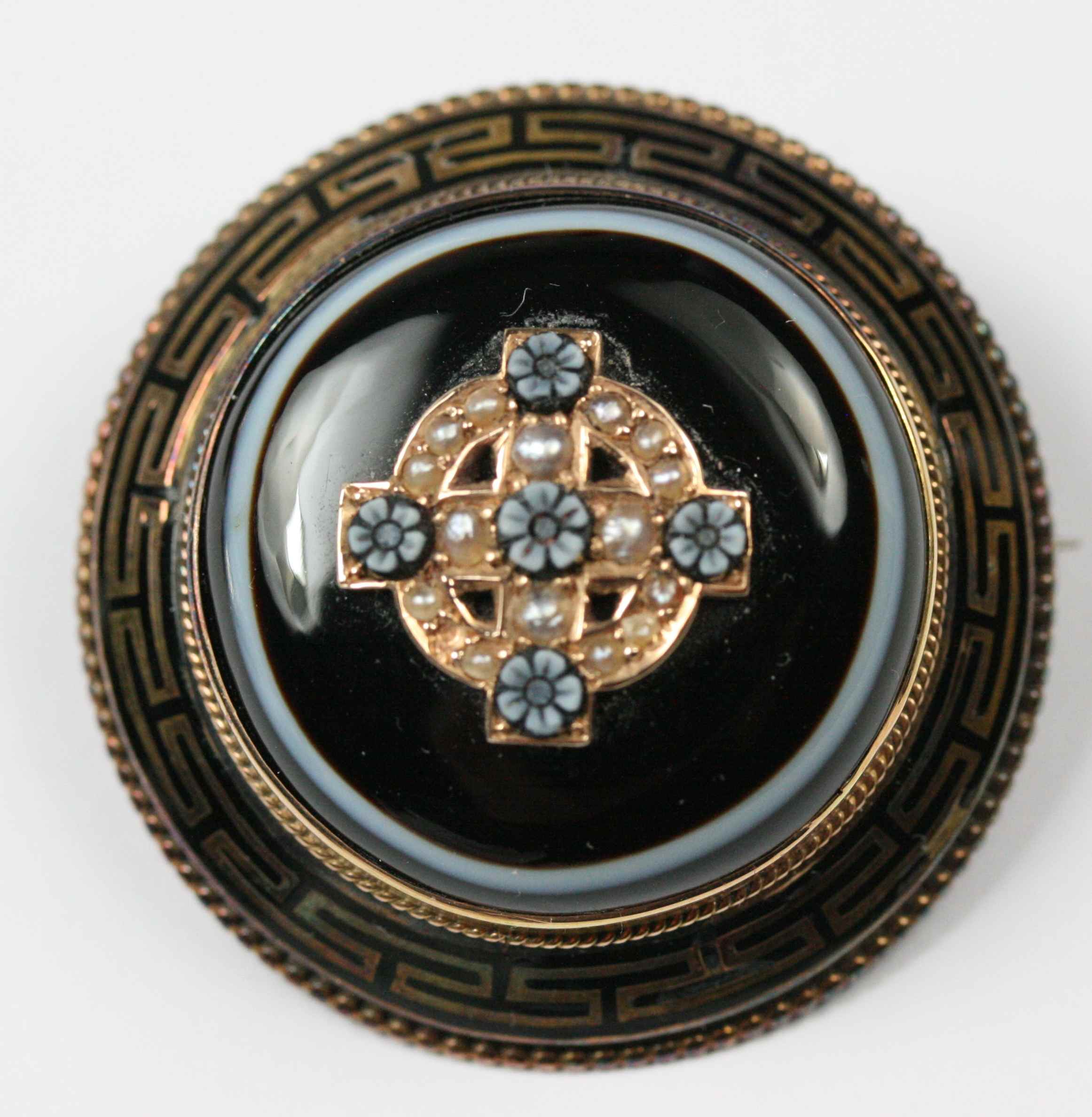 A collection of brooches