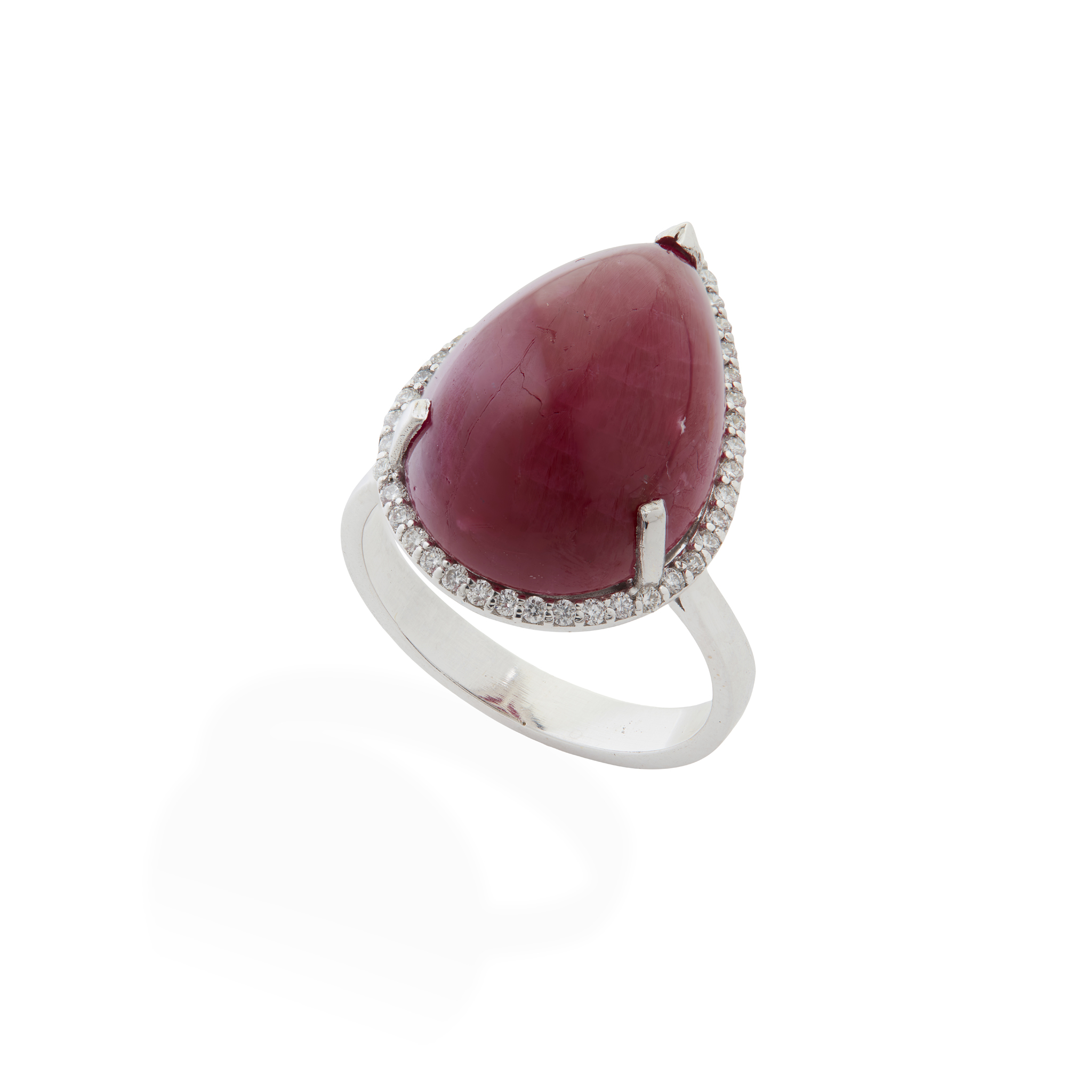 An 18ct gold cabochon ruby and diamond cluster ring