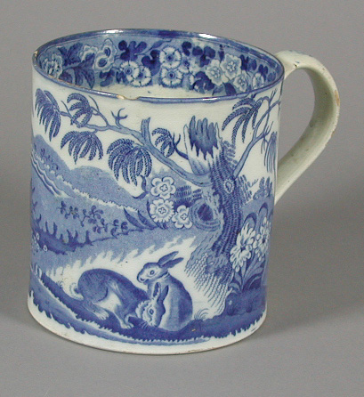 A cylindrical tankard