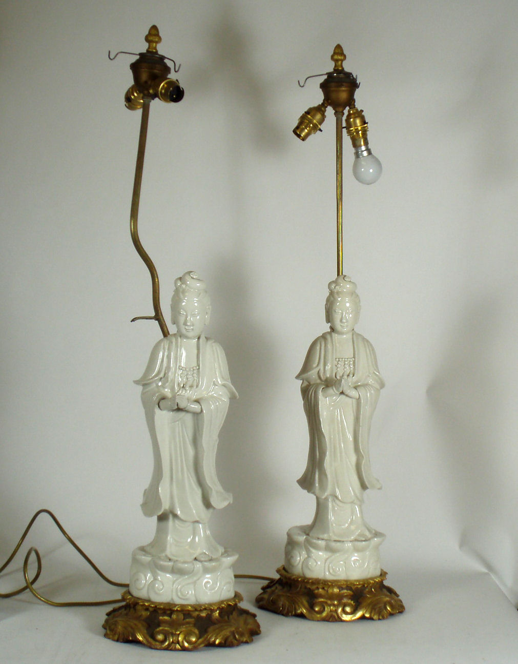 A pair of early 20th century Chinese blanc de chine lamps