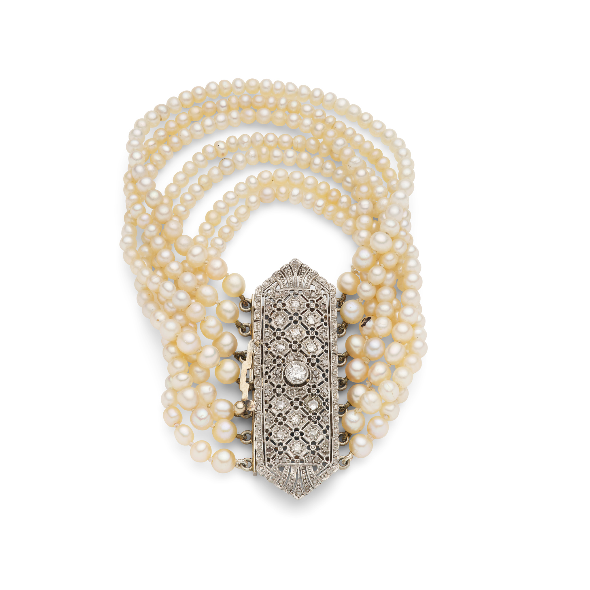 A multi-strand pearl bracelet with diamond clasp