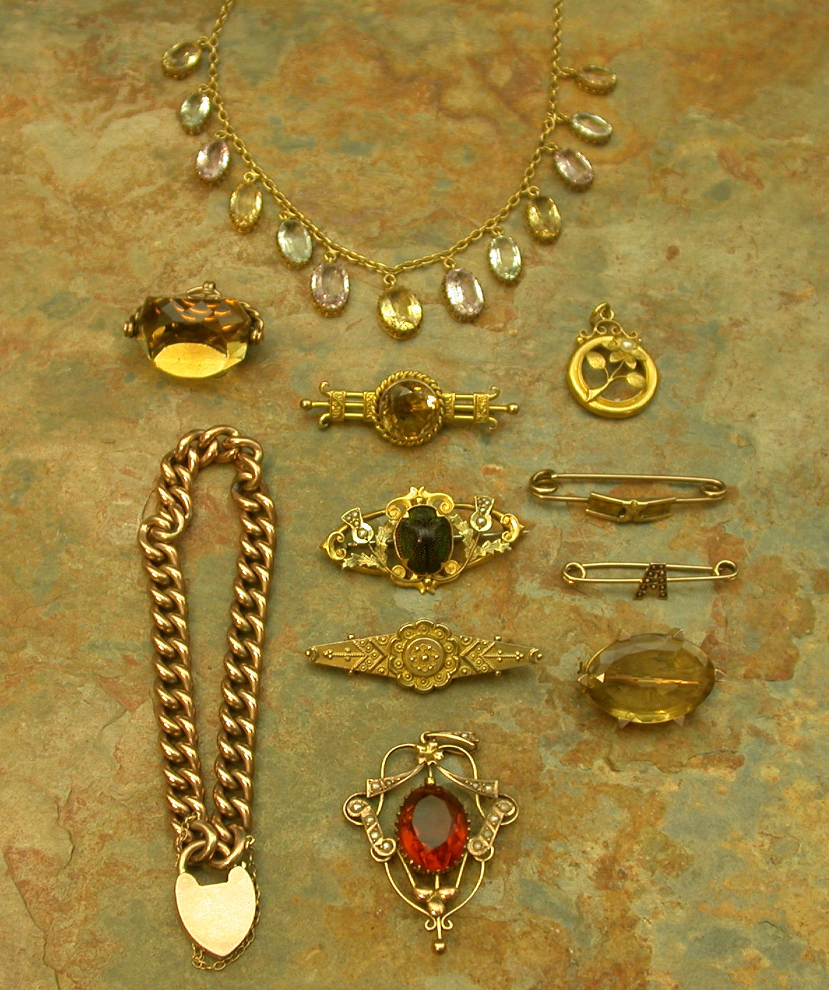 An Edwardian aquamarine, pink and yellow topaz fringe necklace,