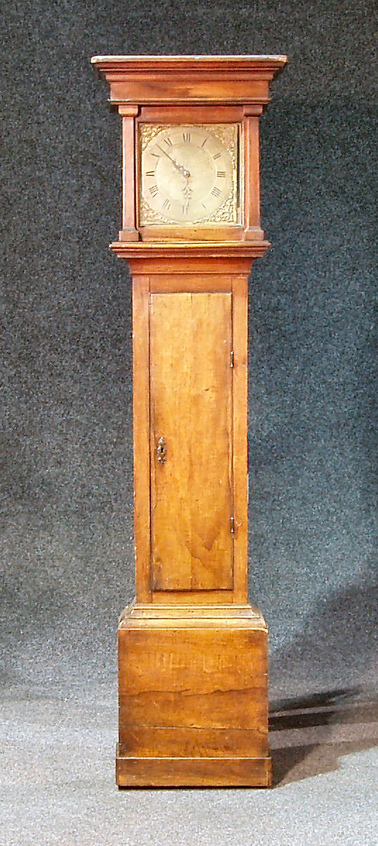 A late 19th century pine longcase clock