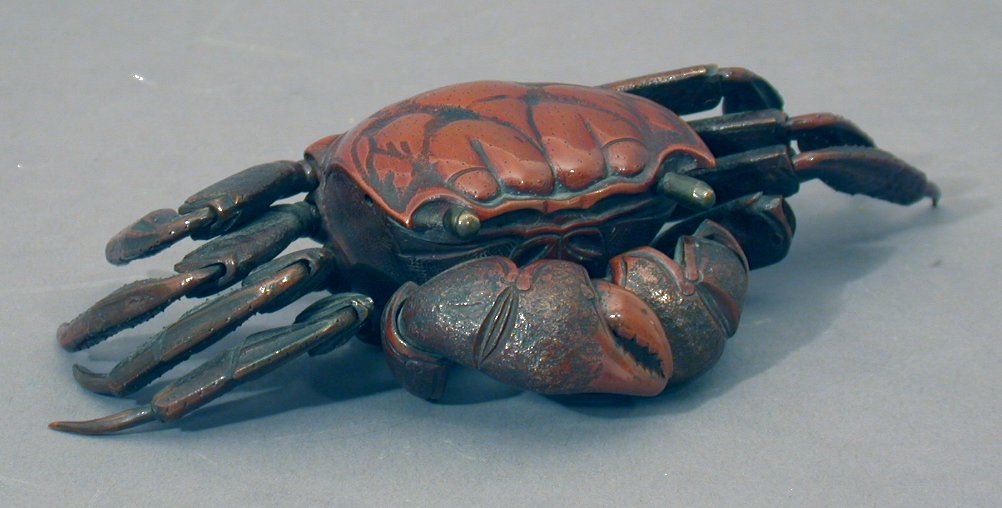 A Japanese bronze articulated model of a crab
