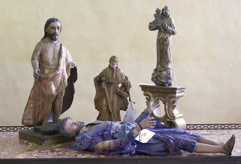 An 19th century wood and plaster crib figure