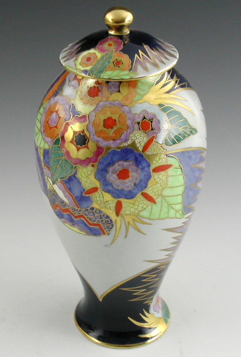 A Carlton Ware baluster vase and cover,